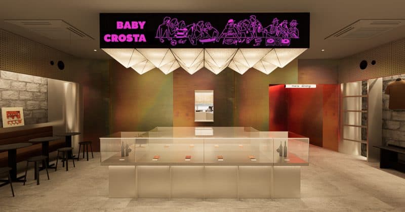 Baby Crosta neon signage above the counter