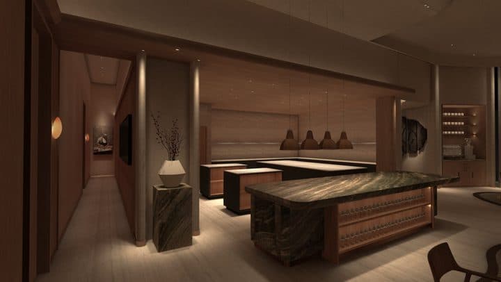 LUME private room with a faceted lantern and wine shelving