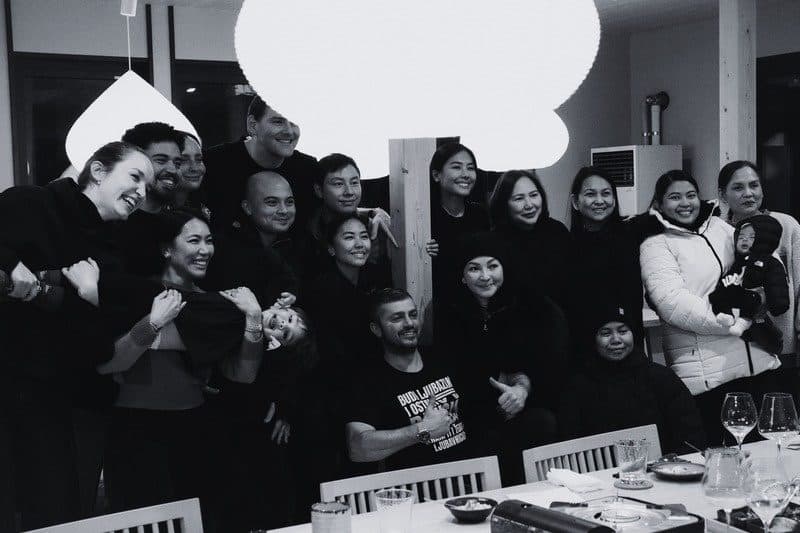 The Black Duck Ventures team together at a long table