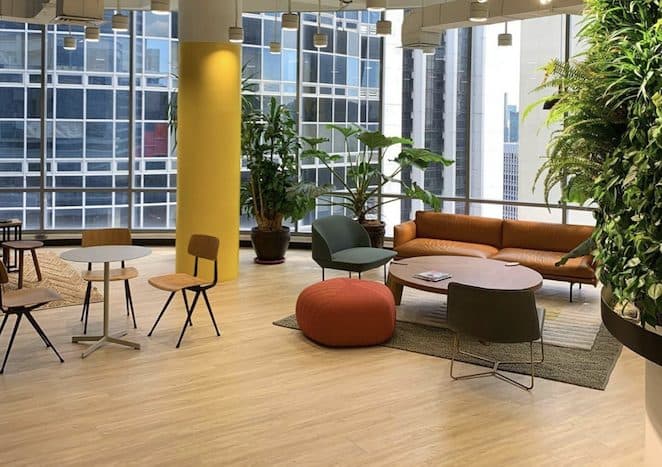 ProSource office interior in Makati with lounge seating and greenery